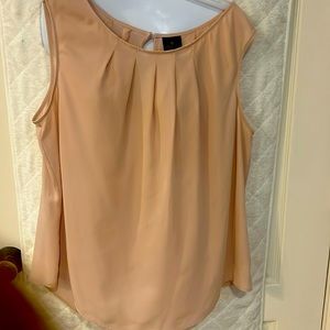 Beautiful blush shell. Perfect spring and summer!